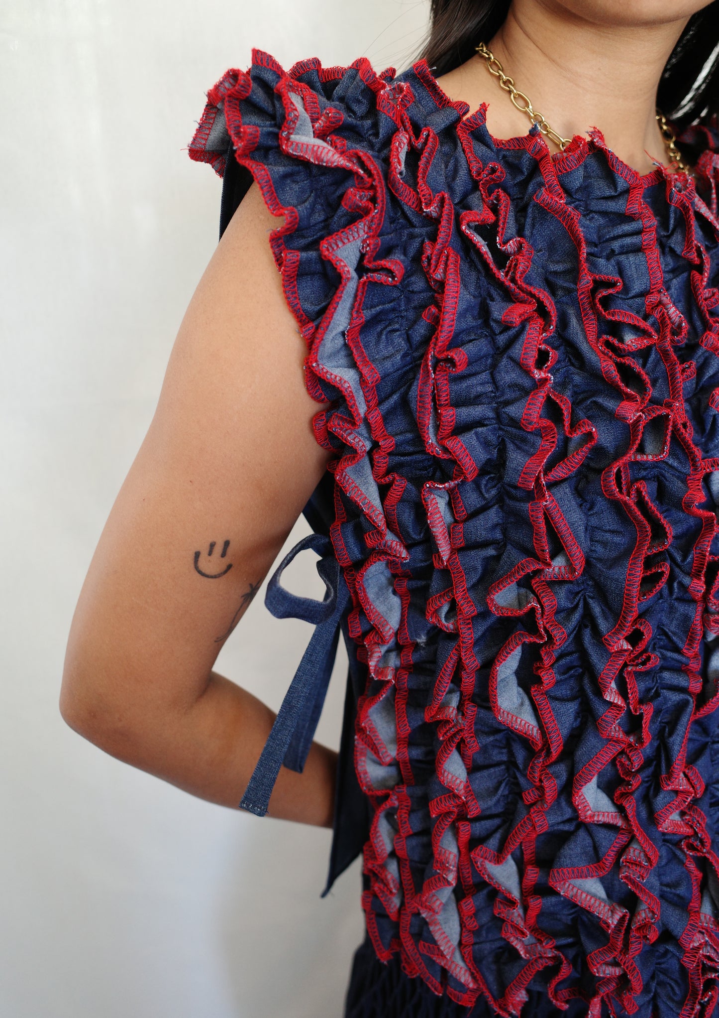 ruffle bib - soft maong navy + red